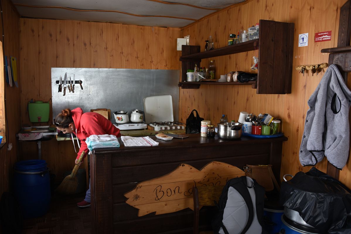 03B Our Cook Cleaning Up In The Kitchen At Garabashi Camp 3730m To Climb Mount Elbrus